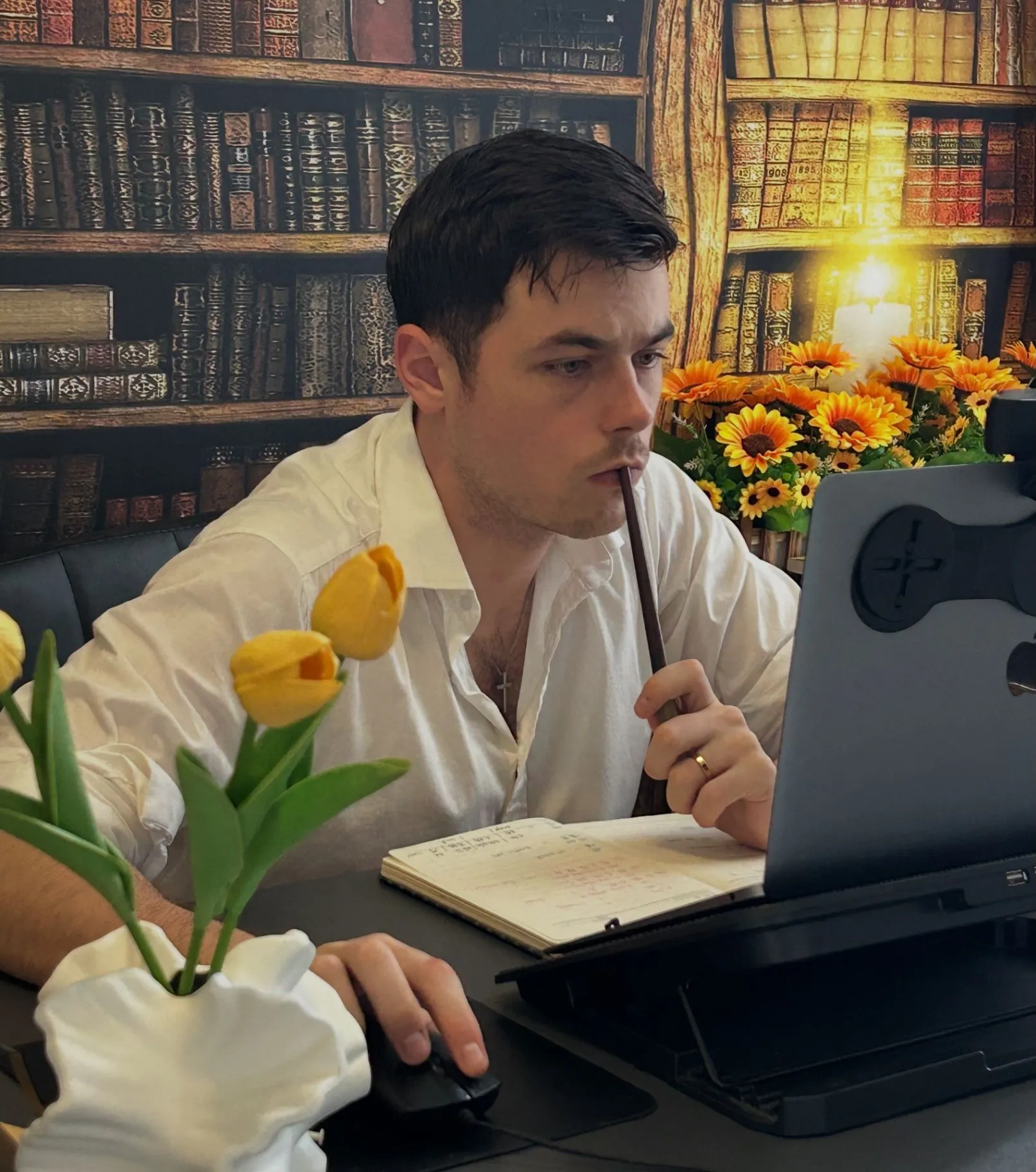 David De' Ath working at his desk